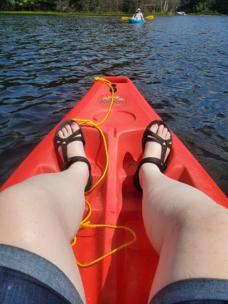 my feet in a kayak