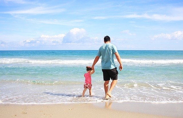 Beach Safety For Kids Tips kid with her dad